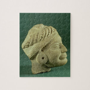 Puzzle Cabeza turbaned pulimentada de la piedra arenisca,