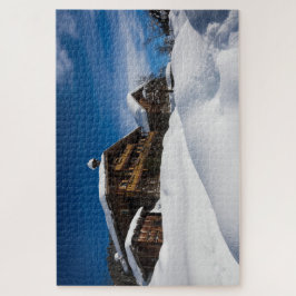 Puzzle Cabinas de madera tradicionales en la nieve