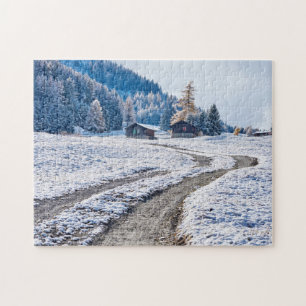 Puzzle Camino de tierra en la tierra de la nieve,