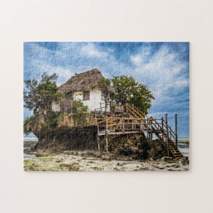 Puzzle Casa pintoresca en un bosque tropical de coral