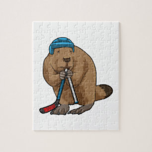 Puzzle castor en hockey sobre hielo con bastón de hockey 