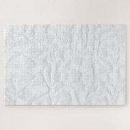 Puzzle chiste machacado de papel blanco