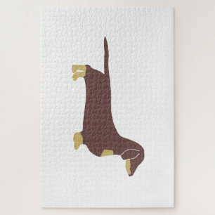 Puzzle chocolate dachshund y silueta de color marrón