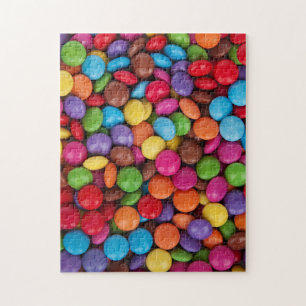 Puzzle chocolates cubiertos de caramelo de colores