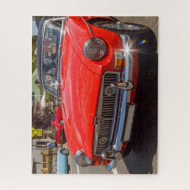 Puzzle Clásico coche deportivo rojo MGB en pista. (Vertical)