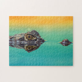 Puzzle Cocodrilo bebé verde en agua con azul y Naranja