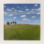 Puzzle Colinas verdes onduladas con cielo azul sobre la n<br><div class="desc">Este divertido rompecabezas presenta una hermosa foto de un soleado día de verano con hierba verde en primer plano y un cielo azul encima. Hay algunos árboles y colinas ondulantes en el horizonte. Gran juego por días cuando estás atrapado dentro.</div>