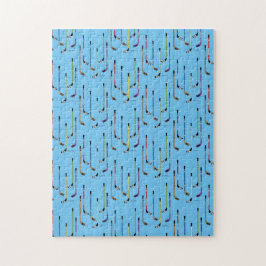 Puzzle Coloridas varas de hockey fondo azul