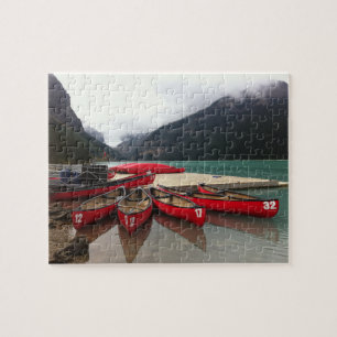 Puzzle con canoas canadienses en el lago