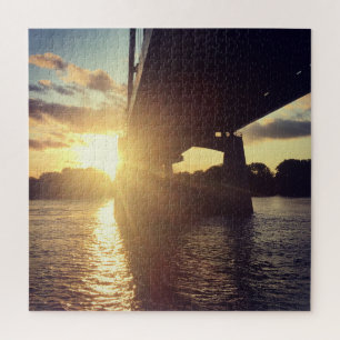 Puzzle crucero de puesta de sol en el río mississippi