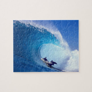 Puzzle Delfínes que practican surf