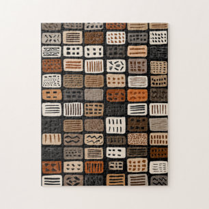 Puzzle diseños textiles de tela de barro africana en una