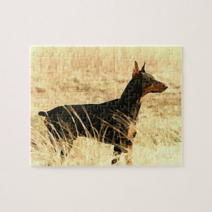 Puzzle Doberman en las cañas secas que pintan imagen