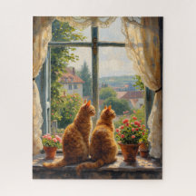 Dos gatos pelirrojos mirando por una ventana