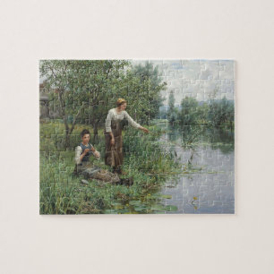 Puzzle Dos mujeres pescando en la hierba junto al río