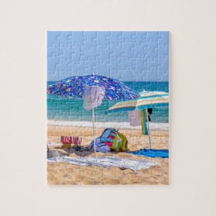 Puzzle Dos sombrillas y fuentes de la playa en sea.JPG