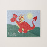 Puzzle Dragón y nombre del galés rojo mágico y lindo de l<br><div class="desc">Este diseño de rompecabezas para niños es bonito y moderno y cuenta con un personalizado de dragón galés rojo intenso,  un fondo azul del cielo y de la colina,  y puede ser personalizado con el nombre de sus hijos. El regalo perfecto para cualquier niño,  en la temática de Gales.</div>