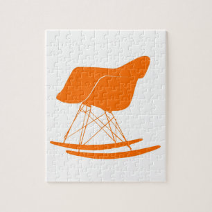 Puzzle Eames moldeó la mecedora plástica