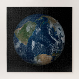 Puzzle Earth With Clouds And Sea Ice