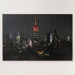 Puzzle Edificio Empire State en el horizonte nocturno roj