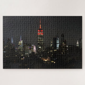 Puzzle Edificio Empire State en el horizonte nocturno roj