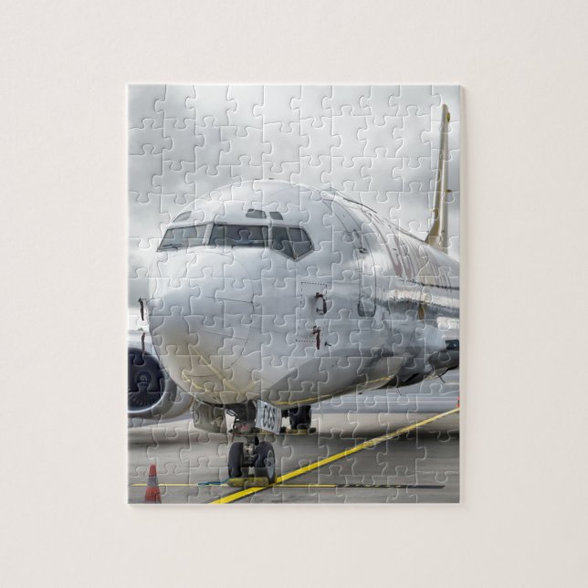 Puzzle El avión en el aeropuerto en el camino (Vertical)