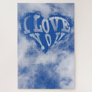 Puzzle El corazón del cielo azul rodeado de nubes. I Love