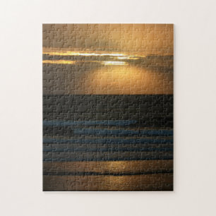 Puzzle El practicar surf en la puesta del sol en el