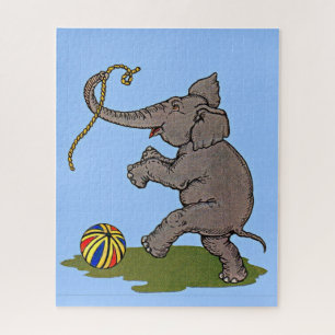 Puzzle elefante feliz jugando con cuerda y bola
