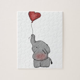 Puzzle Elefante que sostiene el globo