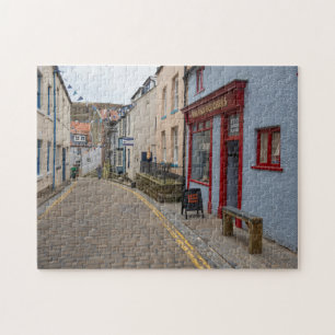Puzzle Encantadora Calle Empe drada en el Pueblo de Stait