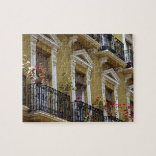 Puzzle España, Sevilla, Andalucía Geranios cuelgan sobre