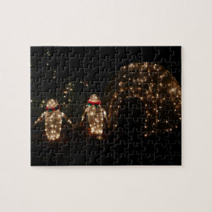 Puzzle Exposición de luces de vacaciones de pingüinos