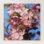 Puzzle Flores de primavera rosada con cielo azul<br><div class="desc">Este desafiante rompecabezas presenta una hermosa foto de flores de arce rosado con un brillante cielo azul en el fondo. Las flores primaverales alegrarán el ambiente cuando estés dentro,  y este rompecabezas proporcionará horas de entretenimiento.</div>