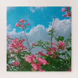 Puzzle Flores rosas bajo cielo azul con nubes - Naturalez