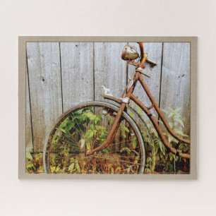 Puzzle Fotografía de bicicleta rústica oxidada con cerca