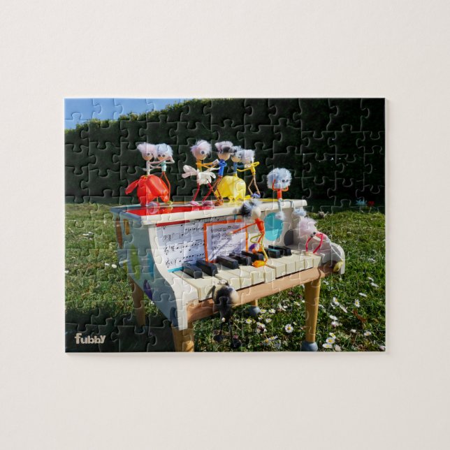 Puzzle Fubby's op piano die muziek maken en dansen. (Horizontal)