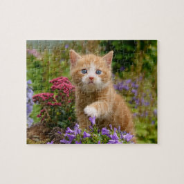 Puzzle Gatito de jengibre en un jardín