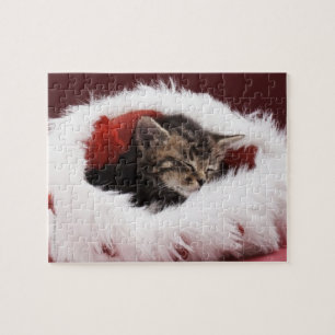 Puzzle Gatito dormido en gorra del navidad