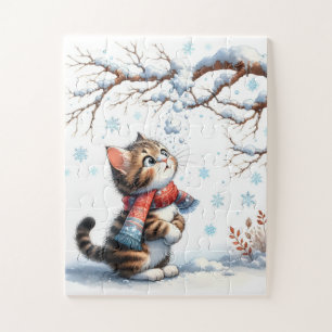 Puzzle Gatito observando la nieve que cae desde una rama