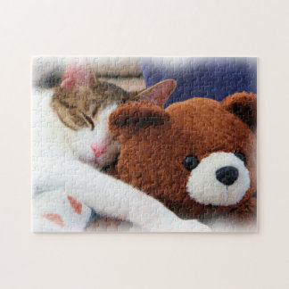 Puzzle Gatito que duerme con el oso de peluche