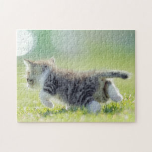 Puzzle Gato del bebé que corre en campo de hierba
