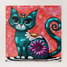 Gato gatito gigante sentado en una alfombra floral
