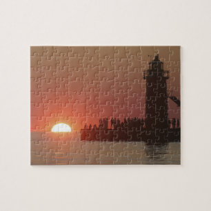 Puzzle Gente faro puesta del sol silueta en el sur