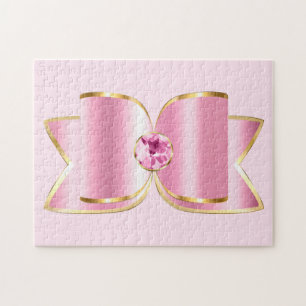 Puzzle Glam Bow rosa con piedra angular