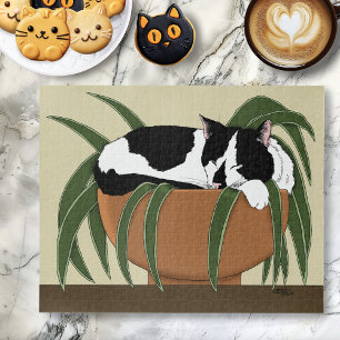 Puzzle Gracioso gato de planta blanca negra