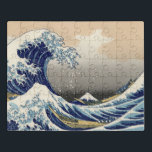 Puzzle Gran ola frente al mar de Kanagawa y Monte Fuji Ja<br><div class="desc">"La Gran Ola de Kanagawa", también conocida como "Under the Wave of Kanagawa", es una cautivante huella de madera del reconocido artista japonés Katsushika Hokusai. Creado alrededor de 1831, es parte de una serie titulada "Treinta y seis vistas del Monte Fuji". La obra representa una escena de inmenso poder y...</div>