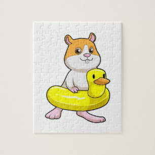 Puzzle Hamster en la playa con pato como anillo de nataci