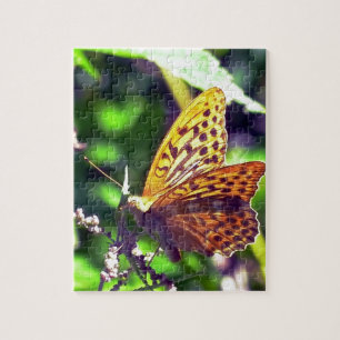 Puzzle Hermosa Naranja y mariposa con manchas negras