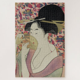 Puzzle Hermoso retrato de Geisha con un peine